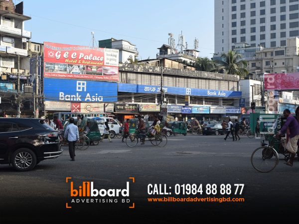 Five Major Benefits of Billboard Advertising. Create billboard designs. Billbaord Ads Rental Company Manufacturer Supplier Maker Mirpur Dhaka Bangladesh Advertising Agency. lamar advertising, billboard advertising. Bank Asia Billboard Signboard Letter Signboard BD largest billboard companies in the us, lamar billboard cost. lamar billboards, lamar company.  lamar billboards near me, lamar billboards owner. best billboard ads of all time, billboard marketing strategy. billboard advertising effectiveness statistics, what is billboard advertising called. digital billboard advertising examples, billboard advertising advantages and disadvantages. newspaper advertising agency in dhaka bangladesh. top 10 advertising agency in bangladesh. list of advertising agency in bangladesh. top advertising agency in bangladesh. billboard advertising cost in bangladesh. billboard advertising in bangladesh. bangladesh agency list. advertising industry in bangladesh. Billboard advertising is the process of using a large scale digital or print ad to market a company, brand, product, service, or campaign. Billboards are typically placed in high-traffic areas, such as along highways and in cities. This helps make sure that they're seen by the highest number of drivers and pedestrians. Billboard advertising is effective for building brand awareness. This is because it broadcasts your business to as many people as possible. Because they’re in such busy areas, billboards tend to have the highest number of views and impressions when compared to other marketing methods. Does billboard advertising work? Until 3D digital billboards started going viral, many people were thinking that billboard advertising was a dated strategy. But while billboards are sometimes criticized for being disruptive, they're also quite effective. While billboard rental costs can be higher than digital advertising, there are many benefits to this type of marketing. In fact, the scale of the audience alone can create a big boost in brand awareness. How big a boost? Let's go over some statistics. Billboard Advertising Statistics Almost 82% of viewers can recall a digital out-of-home ad they saw over a month ago. 2022 Statista data shows that 32% of respondents like billboards, and 9% like them a lot. In comparison, a different Statista survey shows that online ads annoy 41% of respondents. And research from OOH Today says that out-of-home ads show much higher recall for consumers than: Live and streaming television Podcasts and radio Print ads Online ads Billboard advertising reception graphic These incredible numbers may be why top brands are increasing their OOH advertising spending. The Out of Home Advertising Association of America data says that 79% of the top 100 advertisers increased their spending in 2021. Of those, 32% doubled their spending. 27% of the top out-of-home advertisers are technology or D2C brands. Another important area of billboard statistics is the increase in digital billboard advertising. Per 2021 Statista data, there are 350,000 billboards in the United States. Of those, 9,600 are digital billboards. And consumers who see digital billboard advertising often take action. According to 2020 Statista research, 35% of respondents visit a website or search online after seeing a digital billboard. And 20% recommend that product or brand. Plus a 2023 Azoth Analytics report says that the global digital billboards market was worth over $18.5 billion in 2021. The report expects this figure to grow by 7% in the next five years, an increase of more than $1.2 billion. Billboard Advertising Cost The cost of billboard advertising depends on many factors. These include: Billboard location Total traffic in the area Estimated numbers of how many people will see your advertisement Billboard advertising costs are typically charged monthly. They can range anywhere from $250 on a rural highway to upwards of $50,000 in Times Square. The average cost runs around $850 for four weeks. Digital billboard costs start at a slightly higher price point. While some can charge as little as $10 per day, the average cost of a four-week campaign is $2,100. As mentioned above, billboard advertising is out-of-home (OOH) advertising. This is any advertising that reaches consumers when they’re outside their homes. Each OOH advertising opportunity gets an OOH rating. This rating ultimately determines its value and cost to advertisers. Geopath is a nonprofit organization that gives OOH ratings. To do this, it uses technology and media research to estimate the weekly impressions of every billboard in the country. Then, OOH advertising companies, like the companies that own the billboard spaces, pay Geopath for this data. Then they share this data with potential advertisers. According to Geopath, there are up to 10 determining factors that make up an OOH rating and, therefore, the cost of each billboard advertising opportunity. Here are the three main factors: Circulation This is the total number of people who pass by the billboard each week. Local transportation authorities collect and share this information. Demographics This refers to the age, gender, income level, and other characteristics of the traffic that passes the billboard. Geopath collects this information from travel surveys and local transportation authorities. Impressions This is the number of people who see the billboard. This information is calculated based on many factors including: The billboard’s circulation Billboard size How close it is to the road Billboard visibility Traffic speed beside the billboard But the cost of billboard advertising doesn’t stop with "renting" ad space. You must also consider the cost of designing the billboard as well as printing and construction. Depending on what kind of billboard you want to create, this could cost anywhere from $2,000 to $100,000. This cost won’t apply to every billboard, but is something to consider if you want to get creative with your billboard. If you outsource your billboard design, these fees start at $150 but will go up depending on the agency or designer you choose. The complexity of your desired design matters too. For example, if you plan to create a 30-second 3D animation for your digital billboard advertising, these costs could start as high as $1,000 per hour. Billboard Advertising ROI While digital billboard advertising is clearly a popular choice, it's also expensive. But 2022 data shows that digital billboards deliver a 38% ROI. Traditional billboards also have good ROI, with a 40% return on investment. Note: If you plan to run a digital billboard campaign to direct traffic to your website, this ROI calculator can help you figure out what to spend. Billboard advertising ROI may be lower than other forms of content marketing. That said, one of the most powerful reasons to advertise with a billboard is brand recognition. If that's your focus you may want to measure ROAS (return on ad spend) instead. Whether you're looking for a 3:1 or 5:1 return on your investment in billboard advertising, you'll need to do your research before committing. Then, make a plan to create and measure your billboard campaign for effectiveness. For example, adding a CTA with a unique URL to your billboard ad can help you track conversions. The billboard design tips below can also help you create a billboard with strong ROI. Billboard Design Tips and Examples If you’re going to invest in billboard advertising for millions to see, you want it to do its job. Here are a handful of billboard design tips and examples that’ll make sure your billboard is effective and eye-catching. Tell a (short) story. Successful billboards take viewers on a journey. Most billboard designs tell this story with imagery and maybe some text. In fact, most drivers stop reading after a few words. Use your billboard to show the essence of an idea or campaign rather than describing it with text. Apple’s iPhone challenges gather stunning images from iPhone users that highlight the photography features of the product. At the same time, they also add inspiration to public billboards. Billboard advertising examples: Apple iPhone Image Source A story doesn’t have to be complex to be exciting. This 3D digital billboard example from BMW tells the story of their latest model heading out for a quick drive. Make it bold and simple. Drivers or passersby only have a few seconds to get a glimpse at your billboard advertisement. To reach the highest number of viewers (and potential customers), keep your billboard design simple. After all, some people may be blowing by your billboard at 70 mph. Use big, bold fonts against contrasting background colors and avoid narrow, script fonts. Also, choose colors that stand out to viewers. If your billboard is in a rural area, avoid greens, blues, and browns. The fun example below plays with the traditional billboard format to quickly draw attention and engagement. Billboard advertising examples: Specsavers Image Source This billboard example is just text and color, but it makes a bold and clear statement. If your message is the most important part of your billboard, use design decisions like font, layout, and color to draw attention to it. Billboard advertising examples: Disability representation in film and television Image Source Consider its location. You may not have grown up in the neighborhood where you live, but you've probably lived there long enough to foster a certain sense of pride. So, when you wander by billboards that are authentic, you pay attention. Well-designed billboards reflect their location. They take advantage of sports teams, nicknames, nuances, or inside jokes related to the area. This can make the billboard (and brand) much more impressionable to those who see it. The popularity of the Shinjuku digital billboard in Tokyo, Japan makes it a hub for creative inventions like this example from Nike. Mobile billboard advertising like the example below can be where your audience is at the times they need what you’re offering. Billboard advertising examples: Location-specific billboard for coffee drinkers Image Source Some billboard advertising is temporary, but the local billboard below is now one of the icons of the city of Portland, OR. This article talks about the history of the Portland stag billboard and its origins as a sportswear brand advertisement. Billboard advertising examples: Portland stag billboard Make it interactive. Depending on your billboard's location, you may be able to design it so it interacts with its surrounding environment. This strategy makes your ad stick out among the noise. It grabs the attention of passersby. The billboard from Intel and Genvid below is also an interactive game that viewers can play with their mobile devices. Billboard advertising examples: Interactive billboard from Intel and Genvid Image Source Make it memorable. OOH advertising to stand out from the hustle and bustle of a regular commute (or the monotony of a long road trip). Your billboard shouldn’t be any different. We’ve all been there: you’re sitting in bumper-to-bumper traffic and your mind starts to wander. Your eye catches a flashy billboard on the side of the road. Maybe it makes you laugh, or maybe it piques your interest in an upcoming event or product. A smart advertising company chooses billboard locations for optimal viewing: not only will the right location have a lot of traffic, it will also connect your brand with the demographics most likely to take interest in your product or campaign. Billboard advertising isn’t new, in fact, outdoor advertising remains one of the most established marketing strategies. What Is Billboard Advertising? If you’ve ever left your home you’ve probably come into contact with a billboard. Billboards are large-scale form of advertising that market a specific brand or marketing campaign, and are usually placed in high-traffic areas. Billboard placement and design run the gamut: they might be in a city center or along a rural highway; some digital billboards are interactive, and some are 3-D. Categorized as out-of-home advertising (OOH), billboards are among the most common forms of outdoor advertising. By strategically using OOH, an advertising company can increase brand awareness by targeting commuters and foot traffic. Printed Billboard Types Bulletin Billboards Mural Advertising Billboard Posters Wallscape Advertising How Much Does Billboard Advertising Cost? Billboards are a relatively inexpensive form of advertising. While the cost of your billboard campaign will depend on several key factors, including location, length of time, and design, billboards have a high return-on-investment due to the sheer volume of viewers. Although OOH advertising is one of the most cost-effective forms of marketing, renting billboard space can quickly run into the six-figures if you choose a prime location. If you’re determined to rent billboard space in a high-volume area, you may be able to cut costs by keeping your design simple or creating the design in-house. Billboard Design Make Your Design Interactive Once you’ve narrowed down your ideal location, you’ll want to make sure your billboard design appeals to your target audience and the greatest number of people. By making your design interactive you’ll be more likely to capture the attention of your viewers. Consider the location and placement of the billboard, and see if there is a way your design can respond to its surroundings. If it's alongside a Los Angeles freeway, perhaps the content reflects on the ubiquity of traffic in LA. If it’s located in a neighborhood with lots of Victorian architecture, the content might include a historical reference. Be creative! Tell A Story with Your Design People respond best to information that comes in the form of a story. When you design your OOH ad, think of the story that you want to tell. Use images and minimal text to convey an idea. As with the best writing, an effective billboard will show rather than tell. Don’t burden your viewers with too many words; rely on images to tell a story about your brand or product. And don’t be too obscure: your target audience should be able to quickly understand any references. Make Your Design Memorable Remember that your viewers will only rest their eyes on your billboard for a couple of seconds at the most. The design has to be clean, to the point, and eye-catching. If you try to cram too many visuals into your design people won’t bother trying to unpack it all. Use big, bold fonts and simple images with contrasting colors. How To Get Your Billboard Designed When designing your billboard you have the option to create your design in-house or partner with a design company. In general, creating your design in-house will be more affordable, but your design capabilities will be more limited. A professional design company will have more insight into the latest trends and techniques, but their design costs can run upwards of $1k. Consider your priorities and internal bandwidth when making the decision. Billboard Locations One of the benefits of outdoor advertising is that thousands of commuters will see your content. Choosing the right location for your design is a critical component of your OOH marketing campaign, so look closely at your target demographics and consider where they’re most likely to see your content. Remember that an audience in San Francisco may not relate to the same content as an audience in more rural areas, for example. How To Choose Your Billboard Location Depending on your unique marketing campaign, you may not want to choose the most high-traffic areas. Your product may target a specific demographic that doesn’t necessarily frequent commercial city centers, for example. Billboard locations vary widely from state to state, so conduct thorough market research before landing on a location. And keep in mind that some states have laws governing billboard location and design. Vermont, for example, doesn’t permit billboards anywhere in the state. Billboard Advertising Statistics If you want to get started with your billboard advertising campaign, begin your research ASAP. Here are some handy statistics to get you started: There are likely over 2 million billboards in the United States today. About 80% of consumers said they noticed a billboard ad in 2019. Over 50% of people said they’ve been highly engaged by a billboard in the last month. At least 71% of people consciously look at billboards when driving. Pros and Cons of Billboard Advertising PRO - Billboards provide a wide reach. While some forms of targeted advertising can become overly niche, billboards cast a wide net and capture the attention of everyone passing by. No potential customers are left out when you employ a billboard advertising campaign. CON - Some billboards, especially digital billboards and those with 3-D elements, can be costly to design. PRO - Billboard ads are almost always placed to receive maximum exposure. That means there are few visual impediments, like buildings or trees, to block your design. CON - Not all billboard locations are created equal. The best designed billboard campaign can easily languish in a sub-optimal location if you don’t conduct proper research. What are the Advantages of Billboard Advertising? Billboards provide a wide reach. While some forms of targeted advertising can become overly niche, billboards cast a wide net and capture the attention of everyone passing by. No potential customers are left out when you employ a billboard advertising campaign. Other compelling reasons why billboards are great advertising strategy are: 1) Billboards are big and eye-catching 2) Billboards occupy a significant amount of space 3) Billboards can be catchy 4) Good billboards help reach the target audience 5) Today's technology makes it easy to target demographics 6) You can develop a demographic breakdown 7) You can place billboards where your target audience sees them 8) Billboards are a powerful tool to market your business 9) Billboards are a great way to advertise 10) Billboards are an effective marketing strategy 11) Billboards are a cost-effective advertising strategy 12) Billboards are a cheap way to advertise 13) Billboards are a quick way to advertise 14) Billboards are a creative way to advertise 15) Billboards can be used as a form....Impulse buying is very common among people who watch television shows or movies. People often buy things without thinking about it. A billboard can be used as a tool to encourage people to make immediate purchases. When you're on a roadtrip with your friends, and you see a billboard with tempting pizza, it will make your stomach growl and you'll want to stop and eat, even though you didn't plan to do so.Billboards are extremely effective advertising tools. They ensure brand exposure and brand recall. People who see billboards every day will recognize your logo or slogan. Your business name is remembered even after years. Billboards are effective because they reach people of all ages. They also provide a high return on investment. Radio ads and newspaper ads take more money but yield less returns. What Are the Disadvantages of Billboard Advertising? Billboards can be expensive. There are many factors to consider when choosing a billboard company. You need to know how much money you want to spend and what kind of return you expect. Your budget should include the cost of materials, labor, and other fees. You also need to pay attention to weather conditions, because billboards are usually made out of wood or metal. In addition, if the billboard is damaged by wind, rain, or snow, you could be liable for any damage caused by the billboard. A billboard is a medium used by companies to advertise their products. Like other advertising media, such as television, radio, newspapers, etc., it provides a limited amount of information about the product. However, unlike these other media, it allows for a brief, if not fleeting exposure period. This means that viewers cannot easily remember the company name, address, phone number, etc. A billboard ad is a stationary mode of advertising. It doesn't depend on people visiting the place. It focuses on mass marketing, and it can't be personalized. Most importantly, it can't deliver personalized messages that are more effective than those delivered by social media or mobile apps. Who Should Use Billboard Advertising Billboards are especially effective for brands and products that appeal to a wide swath of consumers. Since they receive wide exposure, billboards are less likely to appeal to companies who target a very specific subset of the population. Billboard ads are here to stay, so don’t neglect this critical advertising opportunity. Jump to Section What Is Billboard Advertising? Types of Billboards How Much Does Billboard Advertising Cost? Billboard Design Billboard Locations Billboard Advertising Statistics Pros and Cons of Billboard Advertising What are the Advantages of Billboard Advertising? What are the Disadvantages of Billboard Advertising? Who Should Use Billboard Advertising? Explore Other OOH Media Formats Direct Mail Marketing Digital Out of Home Media Place-Based Advertising Street Furniture Advertising Transit Advertising Windowscape Advertising"