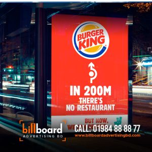 Burger King Billboard, digital billbaord Five Major Benefits of Billboard Advertising. Create billboard designs. Billbaord Ads Rental Company Manufacturer Supplier Maker Mirpur Dhaka Bangladesh Advertising Agency. lamar advertising, billboard advertising. largest billboard companies in the us, lamar billboard cost. lamar billboards, lamar company.  lamar billboards near me, lamar billboards owner. best billboard ads of all time, billboard marketing strategy. billboard advertising effectiveness statistics, what is billboard advertising called. digital billboard advertising examples, billboard advertising advantages and disadvantages. newspaper advertising agency in dhaka bangladesh. top 10 advertising agency in bangladesh. list of advertising agency in bangladesh. top advertising agency in bangladesh. billboard advertising cost in bangladesh. billboard advertising in bangladesh. bangladesh agency list. advertising industry in bangladesh. Billboard advertising is the process of using a large scale digital or print ad to market a company, brand, product, service, or campaign. Billboards are typically placed in high-traffic areas, such as along highways and in cities. This helps make sure that they're seen by the highest number of drivers and pedestrians. Billboard advertising is effective for building brand awareness. This is because it broadcasts your business to as many people as possible. Because they’re in such busy areas, billboards tend to have the highest number of views and impressions when compared to other marketing methods. Does billboard advertising work? Until 3D digital billboards started going viral, many people were thinking that billboard advertising was a dated strategy. But while billboards are sometimes criticized for being disruptive, they're also quite effective. While billboard rental costs can be higher than digital advertising, there are many benefits to this type of marketing. In fact, the scale of the audience alone can create a big boost in brand awareness. How big a boost? Let's go over some statistics. Billboard Advertising Statistics Almost 82% of viewers can recall a digital out-of-home ad they saw over a month ago. 2022 Statista data shows that 32% of respondents like billboards, and 9% like them a lot. In comparison, a different Statista survey shows that online ads annoy 41% of respondents. And research from OOH Today says that out-of-home ads show much higher recall for consumers than: Live and streaming television Podcasts and radio Print ads Online ads Billboard advertising reception graphic These incredible numbers may be why top brands are increasing their OOH advertising spending. The Out of Home Advertising Association of America data says that 79% of the top 100 advertisers increased their spending in 2021. Of those, 32% doubled their spending. 27% of the top out-of-home advertisers are technology or D2C brands. Another important area of billboard statistics is the increase in digital billboard advertising. Per 2021 Statista data, there are 350,000 billboards in the United States. Of those, 9,600 are digital billboards. And consumers who see digital billboard advertising often take action. According to 2020 Statista research, 35% of respondents visit a website or search online after seeing a digital billboard. And 20% recommend that product or brand. Plus a 2023 Azoth Analytics report says that the global digital billboards market was worth over $18.5 billion in 2021. The report expects this figure to grow by 7% in the next five years, an increase of more than $1.2 billion. Billboard Advertising Cost The cost of billboard advertising depends on many factors. These include: Billboard location Total traffic in the area Estimated numbers of how many people will see your advertisement Billboard advertising costs are typically charged monthly. They can range anywhere from $250 on a rural highway to upwards of $50,000 in Times Square. The average cost runs around $850 for four weeks. Digital billboard costs start at a slightly higher price point. While some can charge as little as $10 per day, the average cost of a four-week campaign is $2,100. As mentioned above, billboard advertising is out-of-home (OOH) advertising. This is any advertising that reaches consumers when they’re outside their homes. Each OOH advertising opportunity gets an OOH rating. This rating ultimately determines its value and cost to advertisers. Geopath is a nonprofit organization that gives OOH ratings. To do this, it uses technology and media research to estimate the weekly impressions of every billboard in the country. Then, OOH advertising companies, like the companies that own the billboard spaces, pay Geopath for this data. Then they share this data with potential advertisers. According to Geopath, there are up to 10 determining factors that make up an OOH rating and, therefore, the cost of each billboard advertising opportunity. Here are the three main factors: Circulation This is the total number of people who pass by the billboard each week. Local transportation authorities collect and share this information. Demographics This refers to the age, gender, income level, and other characteristics of the traffic that passes the billboard. Geopath collects this information from travel surveys and local transportation authorities. Impressions This is the number of people who see the billboard. This information is calculated based on many factors including: The billboard’s circulation Billboard size How close it is to the road Billboard visibility Traffic speed beside the billboard But the cost of billboard advertising doesn’t stop with "renting" ad space. You must also consider the cost of designing the billboard as well as printing and construction. Depending on what kind of billboard you want to create, this could cost anywhere from $2,000 to $100,000. This cost won’t apply to every billboard, but is something to consider if you want to get creative with your billboard. If you outsource your billboard design, these fees start at $150 but will go up depending on the agency or designer you choose. The complexity of your desired design matters too. For example, if you plan to create a 30-second 3D animation for your digital billboard advertising, these costs could start as high as $1,000 per hour. Billboard Advertising ROI While digital billboard advertising is clearly a popular choice, it's also expensive. But 2022 data shows that digital billboards deliver a 38% ROI. Traditional billboards also have good ROI, with a 40% return on investment. Note: If you plan to run a digital billboard campaign to direct traffic to your website, this ROI calculator can help you figure out what to spend. Billboard advertising ROI may be lower than other forms of content marketing. That said, one of the most powerful reasons to advertise with a billboard is brand recognition. If that's your focus you may want to measure ROAS (return on ad spend) instead. Whether you're looking for a 3:1 or 5:1 return on your investment in billboard advertising, you'll need to do your research before committing. Then, make a plan to create and measure your billboard campaign for effectiveness. For example, adding a CTA with a unique URL to your billboard ad can help you track conversions. The billboard design tips below can also help you create a billboard with strong ROI. Billboard Design Tips and Examples If you’re going to invest in billboard advertising for millions to see, you want it to do its job. Here are a handful of billboard design tips and examples that’ll make sure your billboard is effective and eye-catching. Tell a (short) story. Successful billboards take viewers on a journey. Most billboard designs tell this story with imagery and maybe some text. In fact, most drivers stop reading after a few words. Use your billboard to show the essence of an idea or campaign rather than describing it with text. Apple’s iPhone challenges gather stunning images from iPhone users that highlight the photography features of the product. At the same time, they also add inspiration to public billboards. Billboard advertising examples: Apple iPhone Image Source A story doesn’t have to be complex to be exciting. This 3D digital billboard example from BMW tells the story of their latest model heading out for a quick drive. Make it bold and simple. Drivers or passersby only have a few seconds to get a glimpse at your billboard advertisement. To reach the highest number of viewers (and potential customers), keep your billboard design simple. After all, some people may be blowing by your billboard at 70 mph. Use big, bold fonts against contrasting background colors and avoid narrow, script fonts. Also, choose colors that stand out to viewers. If your billboard is in a rural area, avoid greens, blues, and browns. The fun example below plays with the traditional billboard format to quickly draw attention and engagement. Billboard advertising examples: Specsavers Image Source This billboard example is just text and color, but it makes a bold and clear statement. If your message is the most important part of your billboard, use design decisions like font, layout, and color to draw attention to it. Billboard advertising examples: Disability representation in film and television Image Source Consider its location. You may not have grown up in the neighborhood where you live, but you've probably lived there long enough to foster a certain sense of pride. So, when you wander by billboards that are authentic, you pay attention. Well-designed billboards reflect their location. They take advantage of sports teams, nicknames, nuances, or inside jokes related to the area. This can make the billboard (and brand) much more impressionable to those who see it. The popularity of the Shinjuku digital billboard in Tokyo, Japan makes it a hub for creative inventions like this example from Nike. Mobile billboard advertising like the example below can be where your audience is at the times they need what you’re offering. Billboard advertising examples: Location-specific billboard for coffee drinkers Image Source Some billboard advertising is temporary, but the local billboard below is now one of the icons of the city of Portland, OR. This article talks about the history of the Portland stag billboard and its origins as a sportswear brand advertisement. Billboard advertising examples: Portland stag billboard Make it interactive. Depending on your billboard's location, you may be able to design it so it interacts with its surrounding environment. This strategy makes your ad stick out among the noise. It grabs the attention of passersby. The billboard from Intel and Genvid below is also an interactive game that viewers can play with their mobile devices. Billboard advertising examples: Interactive billboard from Intel and Genvid Image Source Make it memorable. OOH advertising to stand out from the hustle and bustle of a regular commute (or the monotony of a long road trip). Your billboard shouldn’t be any different. We’ve all been there: you’re sitting in bumper-to-bumper traffic and your mind starts to wander. Your eye catches a flashy billboard on the side of the road. Maybe it makes you laugh, or maybe it piques your interest in an upcoming event or product. A smart advertising company chooses billboard locations for optimal viewing: not only will the right location have a lot of traffic, it will also connect your brand with the demographics most likely to take interest in your product or campaign. Billboard advertising isn’t new, in fact, outdoor advertising remains one of the most established marketing strategies. What Is Billboard Advertising? If you’ve ever left your home you’ve probably come into contact with a billboard. Billboards are large-scale form of advertising that market a specific brand or marketing campaign, and are usually placed in high-traffic areas. Billboard placement and design run the gamut: they might be in a city center or along a rural highway; some digital billboards are interactive, and some are 3-D. Categorized as out-of-home advertising (OOH), billboards are among the most common forms of outdoor advertising. By strategically using OOH, an advertising company can increase brand awareness by targeting commuters and foot traffic. Printed Billboard Types Bulletin Billboards Mural Advertising Billboard Posters Wallscape Advertising How Much Does Billboard Advertising Cost? Billboards are a relatively inexpensive form of advertising. While the cost of your billboard campaign will depend on several key factors, including location, length of time, and design, billboards have a high return-on-investment due to the sheer volume of viewers. Although OOH advertising is one of the most cost-effective forms of marketing, renting billboard space can quickly run into the six-figures if you choose a prime location. If you’re determined to rent billboard space in a high-volume area, you may be able to cut costs by keeping your design simple or creating the design in-house. Billboard Design Make Your Design Interactive Once you’ve narrowed down your ideal location, you’ll want to make sure your billboard design appeals to your target audience and the greatest number of people. By making your design interactive you’ll be more likely to capture the attention of your viewers. Consider the location and placement of the billboard, and see if there is a way your design can respond to its surroundings. If it's alongside a Los Angeles freeway, perhaps the content reflects on the ubiquity of traffic in LA. If it’s located in a neighborhood with lots of Victorian architecture, the content might include a historical reference. Be creative! Tell A Story with Your Design People respond best to information that comes in the form of a story. When you design your OOH ad, think of the story that you want to tell. Use images and minimal text to convey an idea. As with the best writing, an effective billboard will show rather than tell. Don’t burden your viewers with too many words; rely on images to tell a story about your brand or product. And don’t be too obscure: your target audience should be able to quickly understand any references. Make Your Design Memorable Remember that your viewers will only rest their eyes on your billboard for a couple of seconds at the most. The design has to be clean, to the point, and eye-catching. If you try to cram too many visuals into your design people won’t bother trying to unpack it all. Use big, bold fonts and simple images with contrasting colors. How To Get Your Billboard Designed When designing your billboard you have the option to create your design in-house or partner with a design company. In general, creating your design in-house will be more affordable, but your design capabilities will be more limited. A professional design company will have more insight into the latest trends and techniques, but their design costs can run upwards of $1k. Consider your priorities and internal bandwidth when making the decision. Billboard Locations One of the benefits of outdoor advertising is that thousands of commuters will see your content. Choosing the right location for your design is a critical component of your OOH marketing campaign, so look closely at your target demographics and consider where they’re most likely to see your content. Remember that an audience in San Francisco may not relate to the same content as an audience in more rural areas, for example. How To Choose Your Billboard Location Depending on your unique marketing campaign, you may not want to choose the most high-traffic areas. Your product may target a specific demographic that doesn’t necessarily frequent commercial city centers, for example. Billboard locations vary widely from state to state, so conduct thorough market research before landing on a location. And keep in mind that some states have laws governing billboard location and design. Vermont, for example, doesn’t permit billboards anywhere in the state. Billboard Advertising Statistics If you want to get started with your billboard advertising campaign, begin your research ASAP. Here are some handy statistics to get you started: There are likely over 2 million billboards in the United States today. About 80% of consumers said they noticed a billboard ad in 2019. Over 50% of people said they’ve been highly engaged by a billboard in the last month. At least 71% of people consciously look at billboards when driving. Pros and Cons of Billboard Advertising PRO - Billboards provide a wide reach. While some forms of targeted advertising can become overly niche, billboards cast a wide net and capture the attention of everyone passing by. No potential customers are left out when you employ a billboard advertising campaign. CON - Some billboards, especially digital billboards and those with 3-D elements, can be costly to design. PRO - Billboard ads are almost always placed to receive maximum exposure. That means there are few visual impediments, like buildings or trees, to block your design. CON - Not all billboard locations are created equal. The best designed billboard campaign can easily languish in a sub-optimal location if you don’t conduct proper research. What are the Advantages of Billboard Advertising? Billboards provide a wide reach. While some forms of targeted advertising can become overly niche, billboards cast a wide net and capture the attention of everyone passing by. No potential customers are left out when you employ a billboard advertising campaign. Other compelling reasons why billboards are great advertising strategy are: 1) Billboards are big and eye-catching 2) Billboards occupy a significant amount of space 3) Billboards can be catchy 4) Good billboards help reach the target audience 5) Today's technology makes it easy to target demographics 6) You can develop a demographic breakdown 7) You can place billboards where your target audience sees them 8) Billboards are a powerful tool to market your business 9) Billboards are a great way to advertise 10) Billboards are an effective marketing strategy 11) Billboards are a cost-effective advertising strategy 12) Billboards are a cheap way to advertise 13) Billboards are a quick way to advertise 14) Billboards are a creative way to advertise 15) Billboards can be used as a form....Impulse buying is very common among people who watch television shows or movies. People often buy things without thinking about it. A billboard can be used as a tool to encourage people to make immediate purchases. When you're on a roadtrip with your friends, and you see a billboard with tempting pizza, it will make your stomach growl and you'll want to stop and eat, even though you didn't plan to do so.Billboards are extremely effective advertising tools. They ensure brand exposure and brand recall. People who see billboards every day will recognize your logo or slogan. Your business name is remembered even after years. Billboards are effective because they reach people of all ages. They also provide a high return on investment. Radio ads and newspaper ads take more money but yield less returns. What Are the Disadvantages of Billboard Advertising? Billboards can be expensive. There are many factors to consider when choosing a billboard company. You need to know how much money you want to spend and what kind of return you expect. Your budget should include the cost of materials, labor, and other fees. You also need to pay attention to weather conditions, because billboards are usually made out of wood or metal. In addition, if the billboard is damaged by wind, rain, or snow, you could be liable for any damage caused by the billboard. A billboard is a medium used by companies to advertise their products. Like other advertising media, such as television, radio, newspapers, etc., it provides a limited amount of information about the product. However, unlike these other media, it allows for a brief, if not fleeting exposure period. This means that viewers cannot easily remember the company name, address, phone number, etc. A billboard ad is a stationary mode of advertising. It doesn't depend on people visiting the place. It focuses on mass marketing, and it can't be personalized. Most importantly, it can't deliver personalized messages that are more effective than those delivered by social media or mobile apps. Who Should Use Billboard Advertising Billboards are especially effective for brands and products that appeal to a wide swath of consumers. Since they receive wide exposure, billboards are less likely to appeal to companies who target a very specific subset of the population. Billboard ads are here to stay, so don’t neglect this critical advertising opportunity. Jump to Section What Is Billboard Advertising? Types of Billboards How Much Does Billboard Advertising Cost? Billboard Design Billboard Locations Billboard Advertising Statistics Pros and Cons of Billboard Advertising What are the Advantages of Billboard Advertising? What are the Disadvantages of Billboard Advertising? Who Should Use Billboard Advertising? Explore Other OOH Media Formats Direct Mail Marketing Digital Out of Home Media Place-Based Advertising Street Furniture Advertising Transit Advertising Windowscape Advertising"